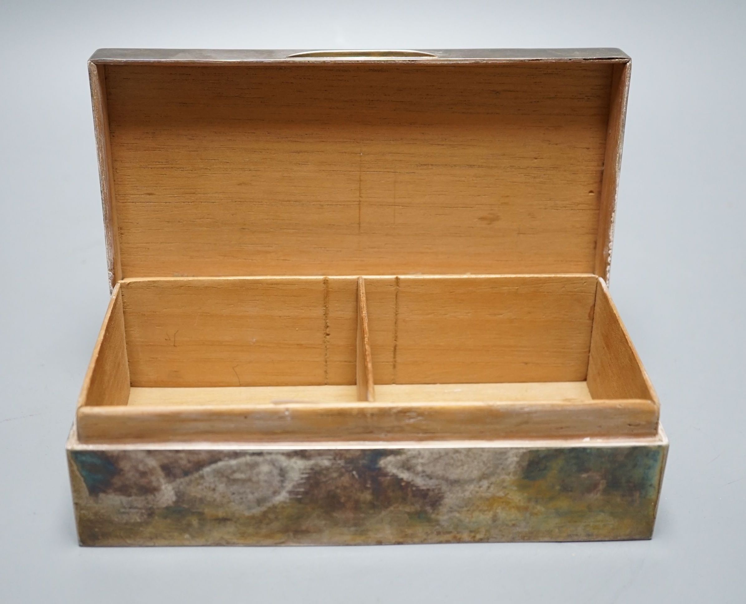A George V silver mounted rectangular cigarette box, Birmingham, 1922, 18.6cm.